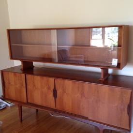 MaxSold Auction: This auction features a selection of teak furniture, including nesting tables, high back armchair, sideboard with glass doors, record cabinet, wall unit, and a bedroom set. Also has books, carpets, assorted china, electronics, decorative items and more!